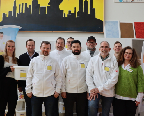 reinecke Teamfoto Das Team der reinecke malereibetrieb GmbH bestehend aus Handwerkern und Bürokräften